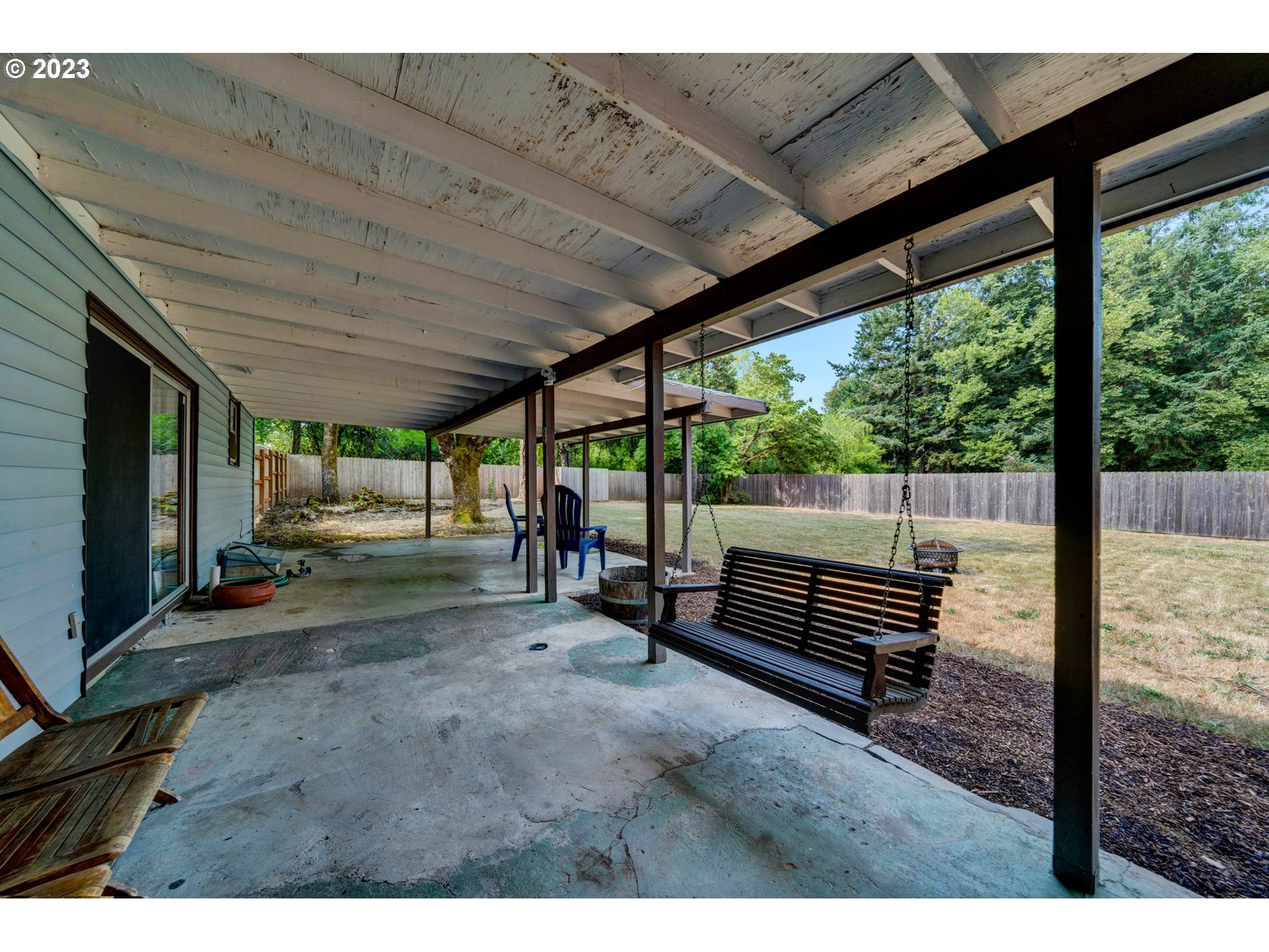 24065 Southeast Tillstrom Road Damascus, OR 97089 - Photo 26 of 38 a view of outdoor space with seating