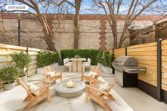 a kitchen with granite countertop a sink stove and cabinets