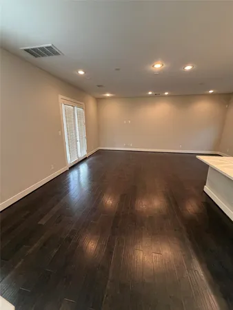 a view of balcony with wooden floor