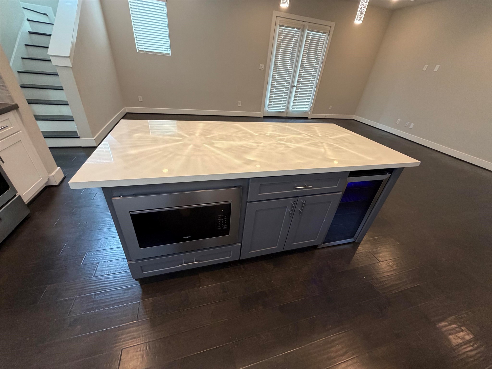 10806 Warwana Road, Unit A Houston, TX 77043 - Photo 18 of 37 a room with wooden floor and fireplace