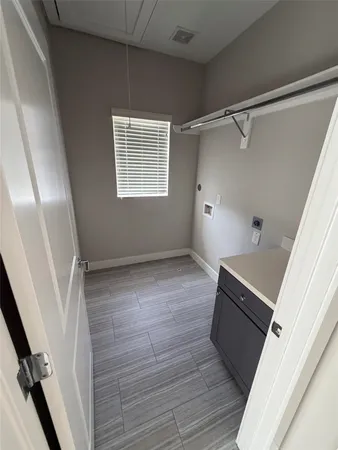 a bathroom with a large tub and sink