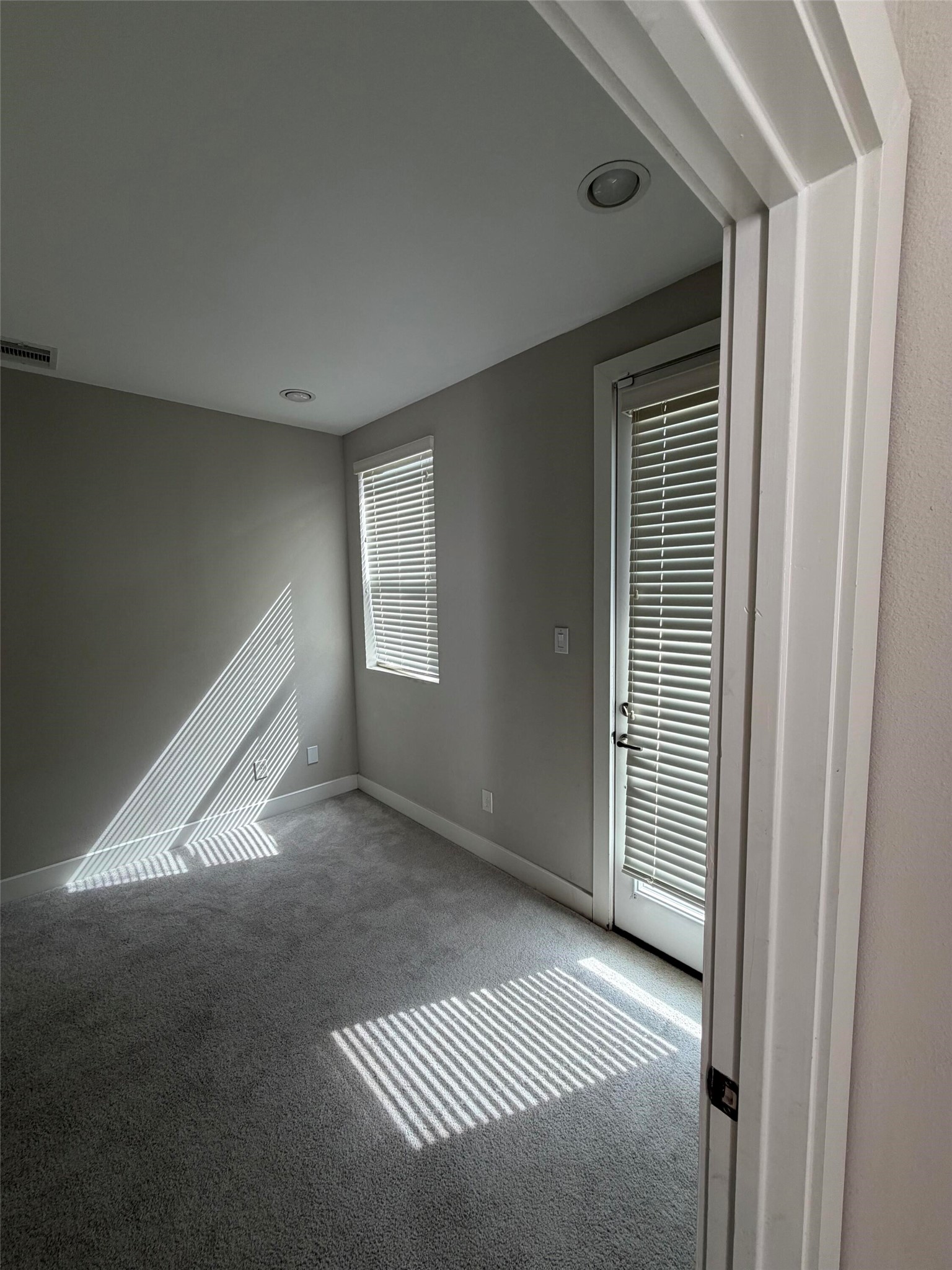 10806 Warwana Road, Unit A Houston, TX 77043 - Photo 6 of 37 a view of an empty room and window