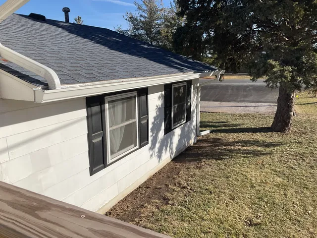a view of outdoor space with deck and living room