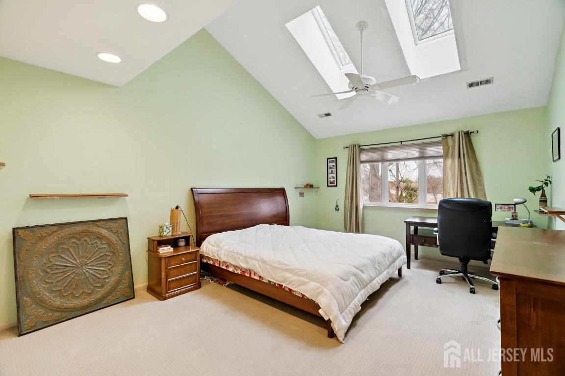 118 Coppertree Court Edison, NJ 08820 - Photo 19 of 38 a bedroom with a bed chair and dresser