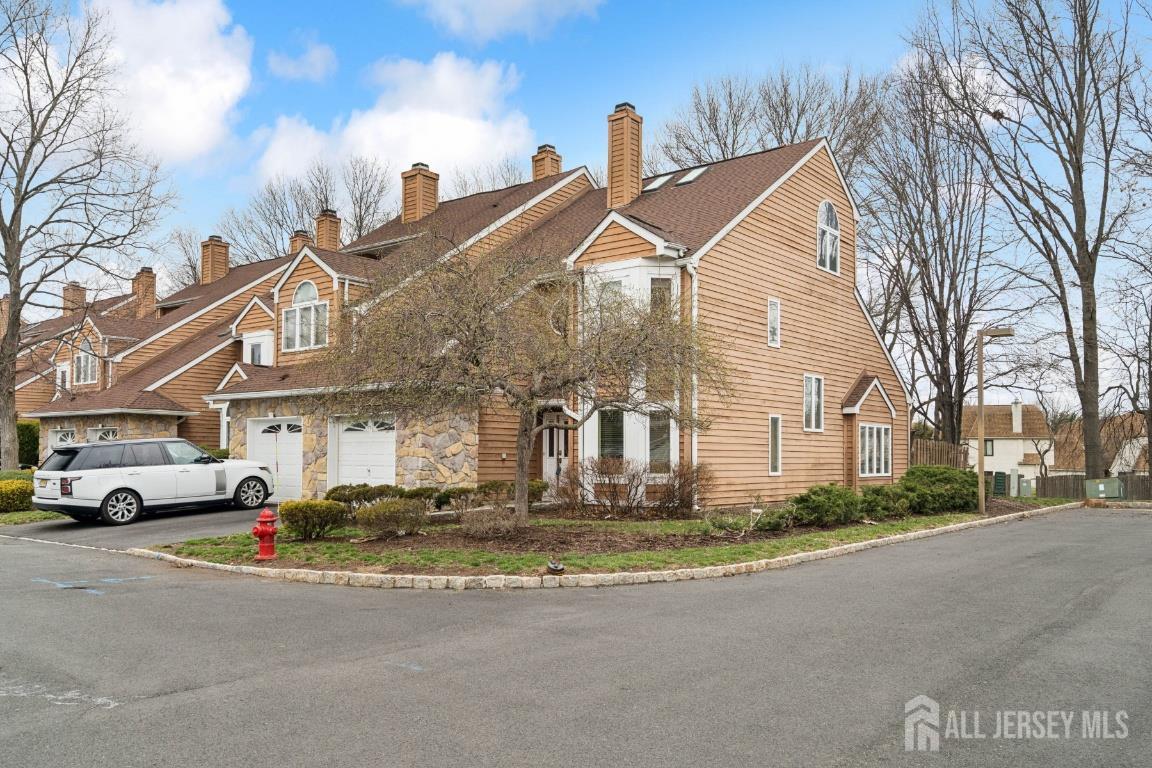 118 Coppertree Court Edison, NJ 08820 - Photo 2 of 38 a buildings view with a street
