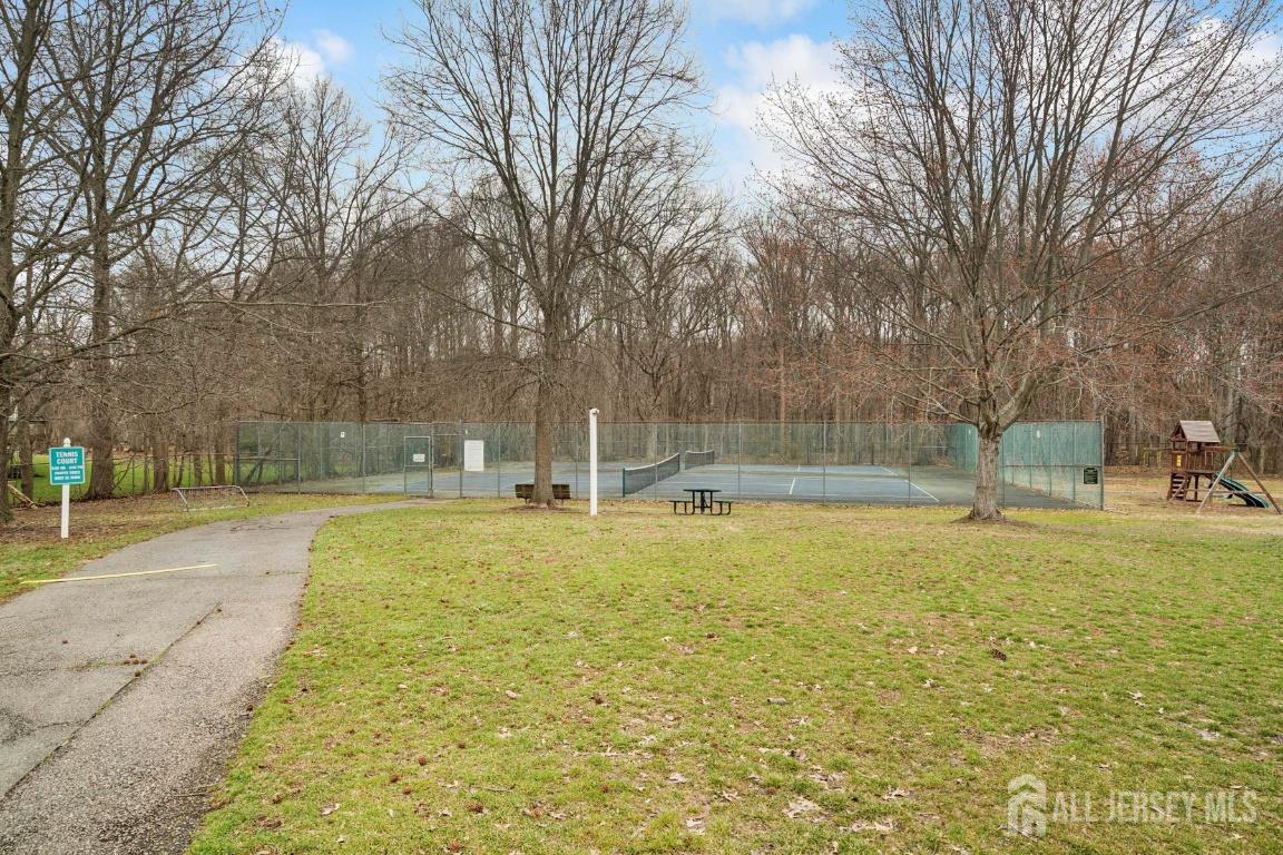 118 Coppertree Court Edison, NJ 08820 - Photo 26 of 38 a view of yard with swimming pool and trees