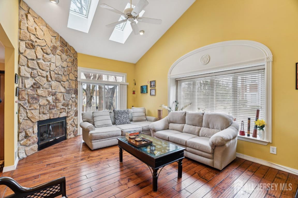 118 Coppertree Court Edison, NJ 08820 - Photo 5 of 38 a living room with furniture and a fireplace