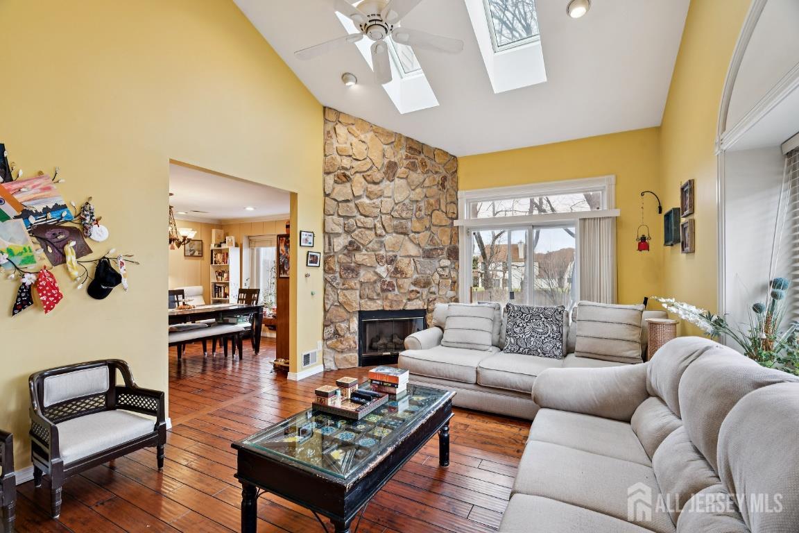 118 Coppertree Court Edison, NJ 08820 - Photo 6 of 38 a living room with furniture and a fireplace