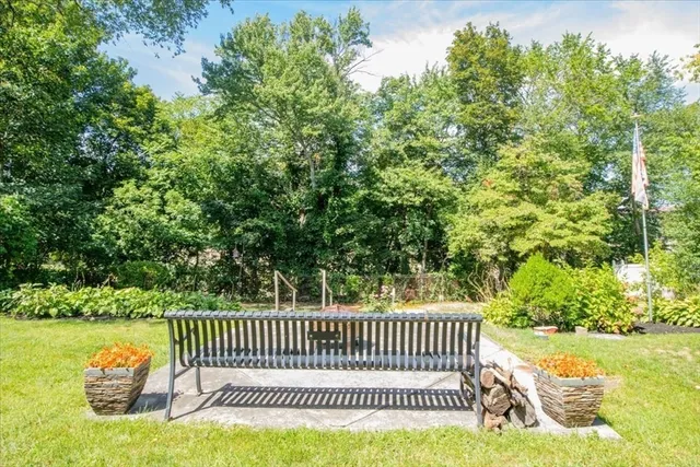 a view of a swimming pool with a garden