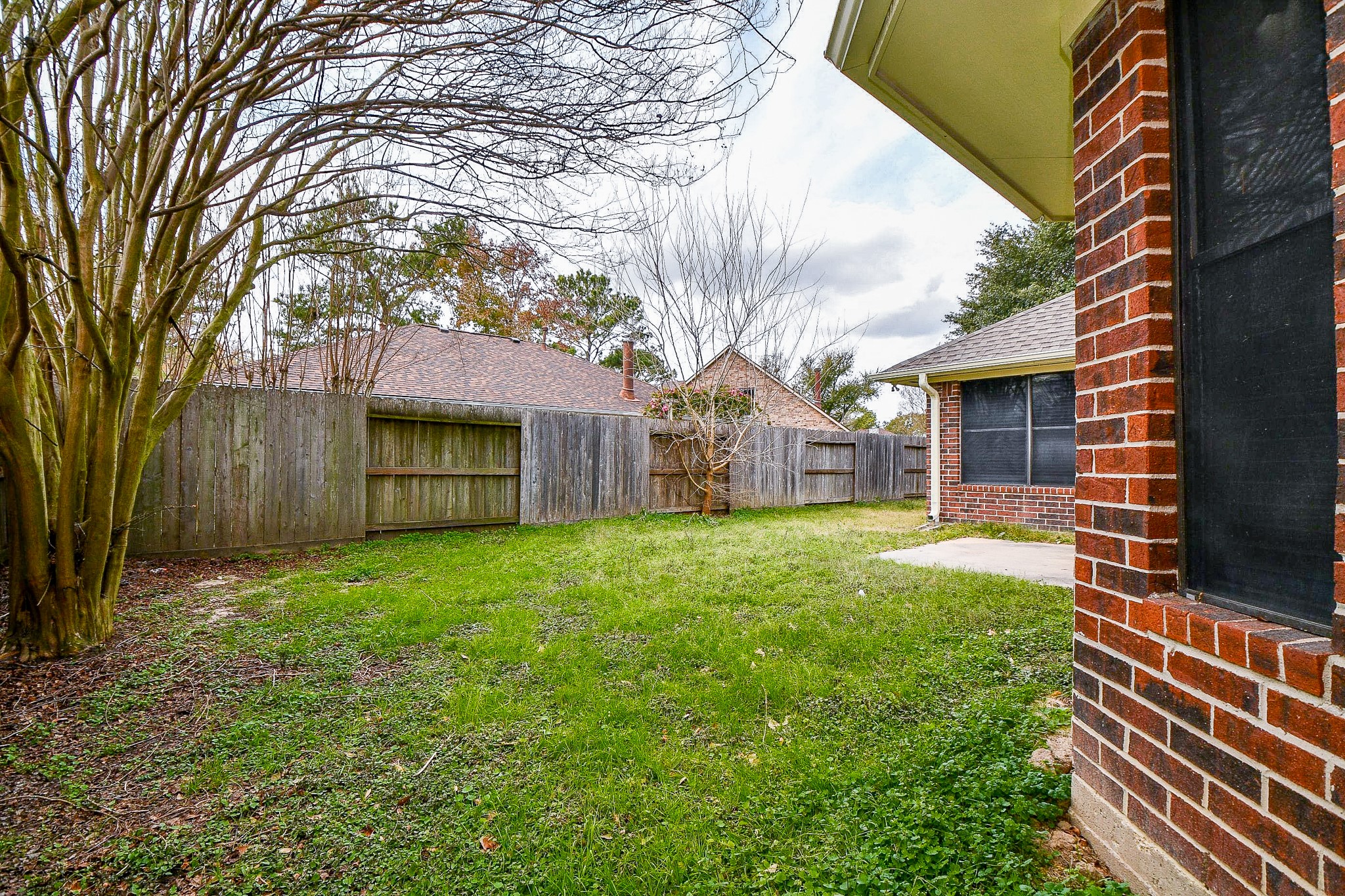 10919 Rustling Winds Drive Houston, TX 77064 - Photo 18 of 20 a view of a house with a yard