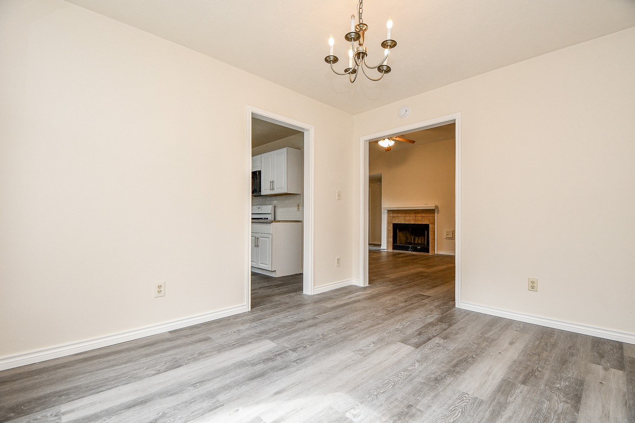 10919 Rustling Winds Drive Houston, TX 77064 - Photo 5 of 20 wooden floor in an empty room with a window