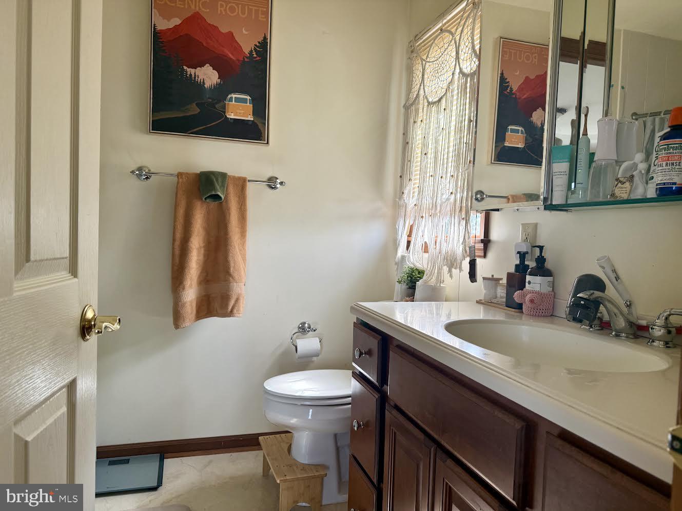 507 North Main Street Glassboro, NJ 08028 - Photo 14 of 15 a bathroom with a sink and a mirror