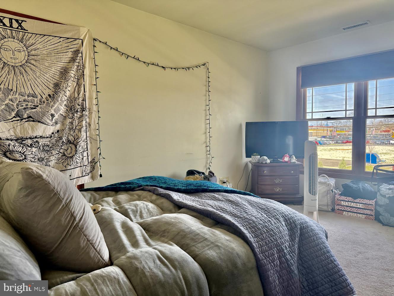 507 North Main Street Glassboro, NJ 08028 - Photo 8 of 15 a bedroom with a bed and a window