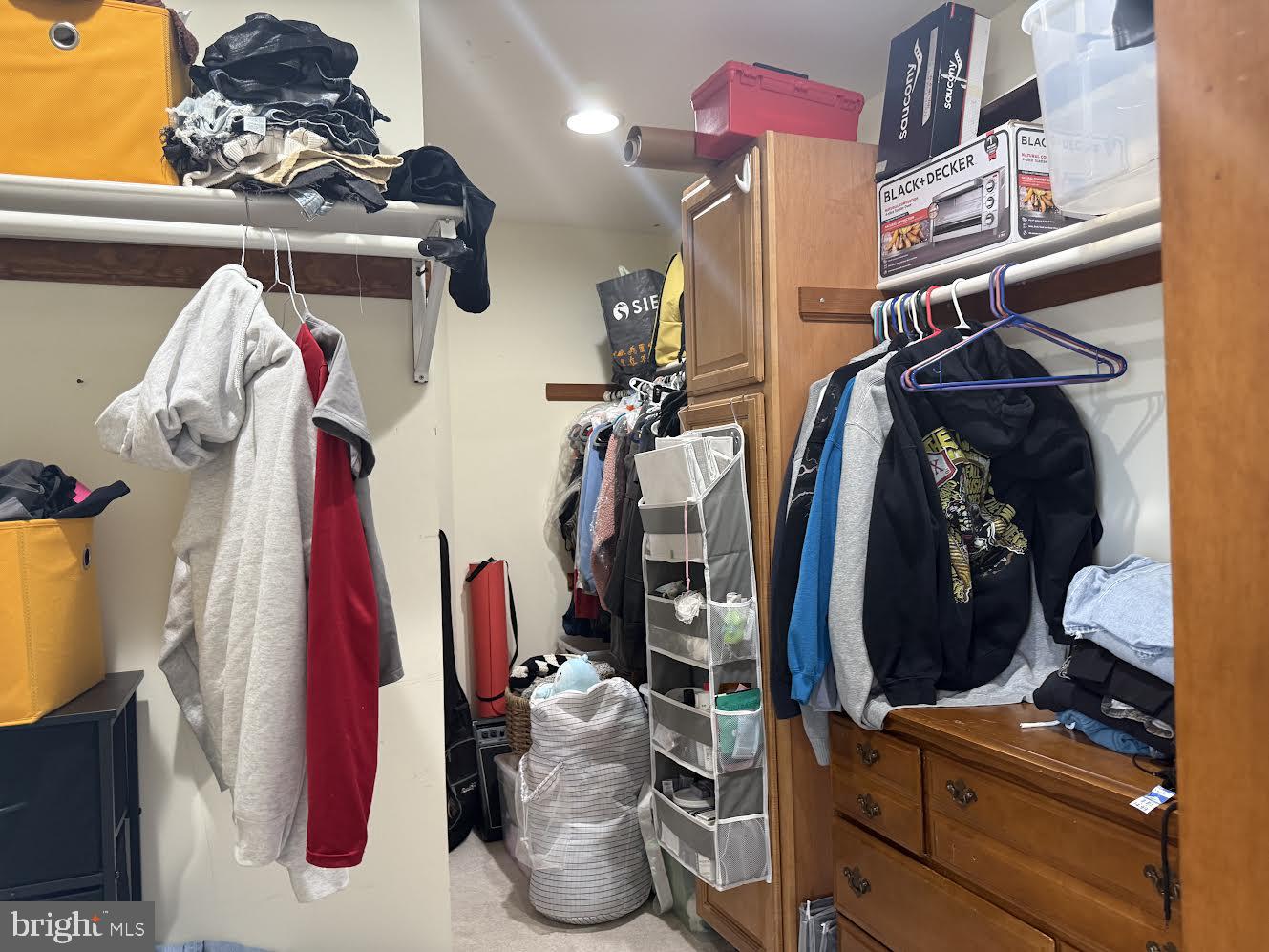 507 North Main Street Glassboro, NJ 08028 - Photo 9 of 15 a view of walk in closet with clothes and shoes