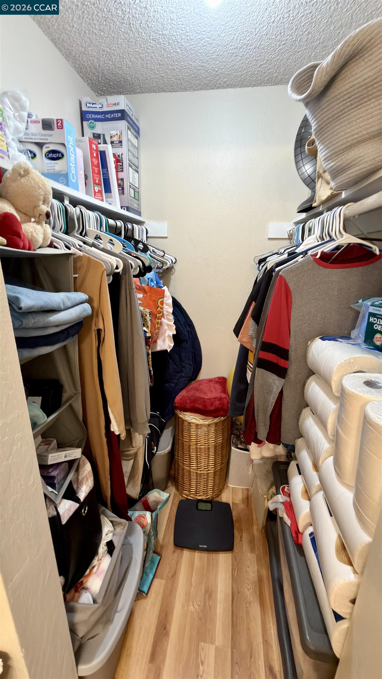 1360 Del Rio Court, Unit 4 Concord, CA 94518 - Photo 14 of 19 a view of walk in closet with clothes and shoes