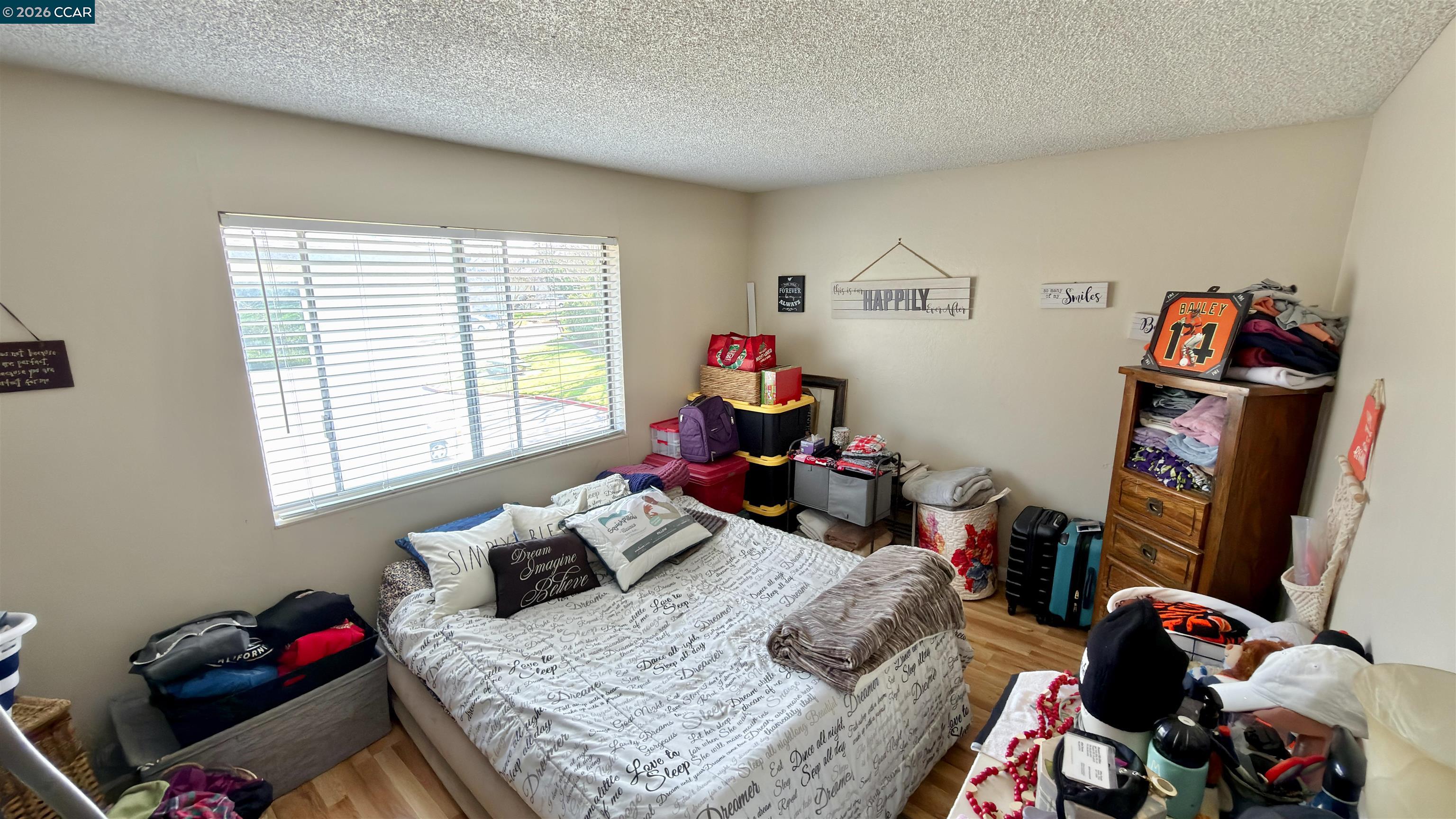 1360 Del Rio Court, Unit 4 Concord, CA 94518 - Photo 15 of 19 a bedroom with furniture and a bed
