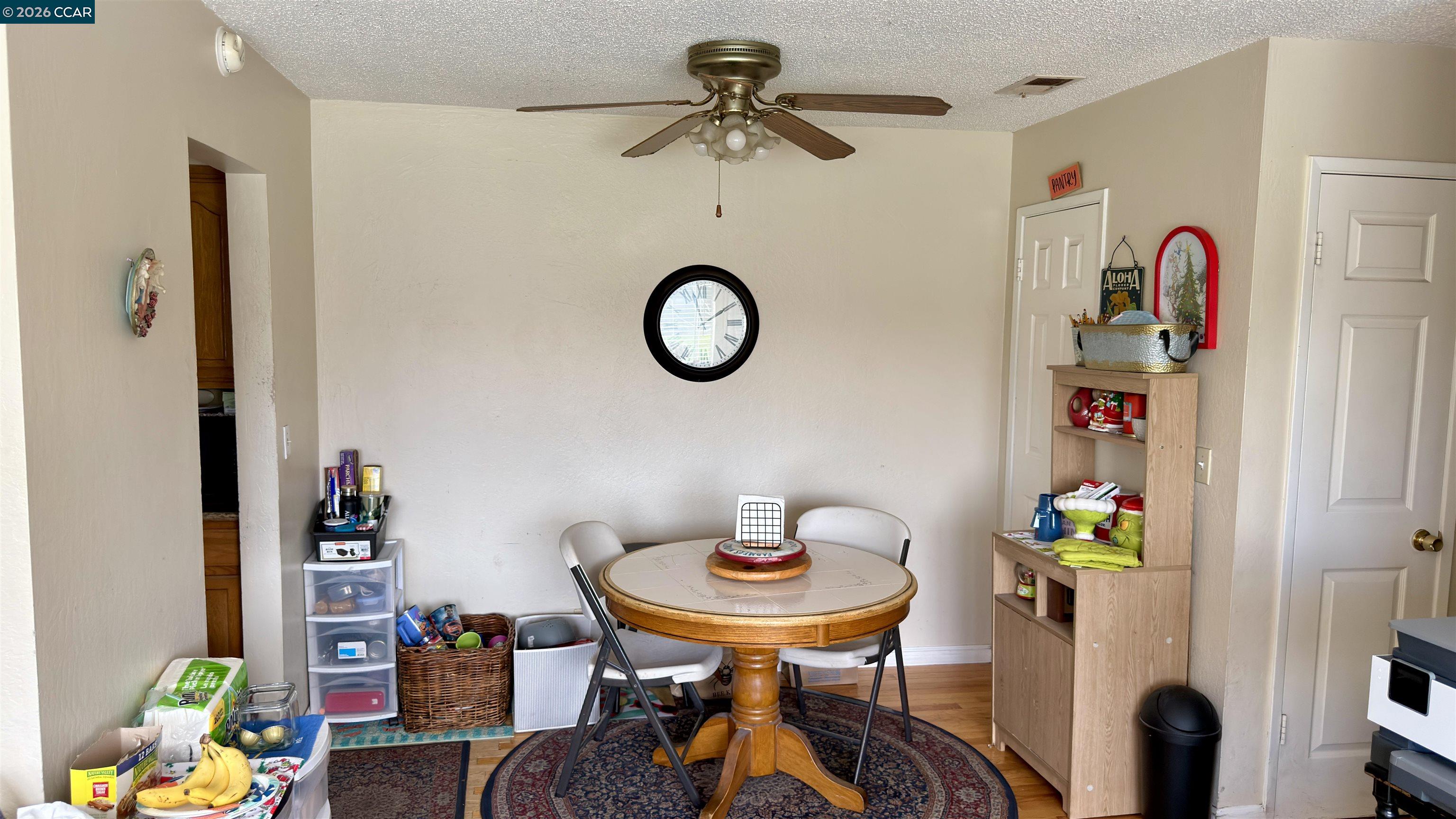 1360 Del Rio Court, Unit 4 Concord, CA 94518 - Photo 8 of 19 a view of a dining room with a table and chairs
