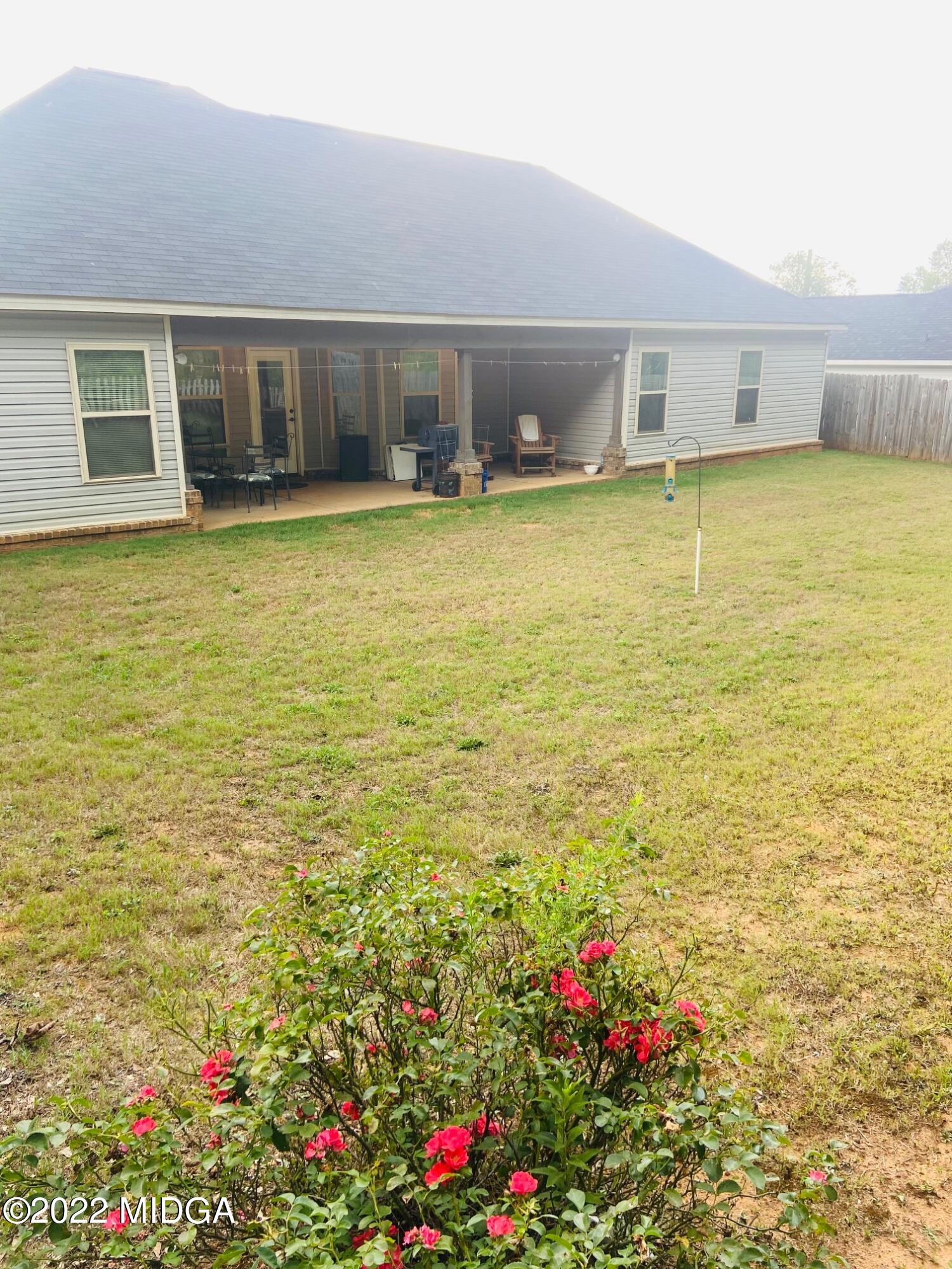 304 Durgin Drive Bonaire, GA 31005 - Photo 21 of 22 a view of a house with a yard