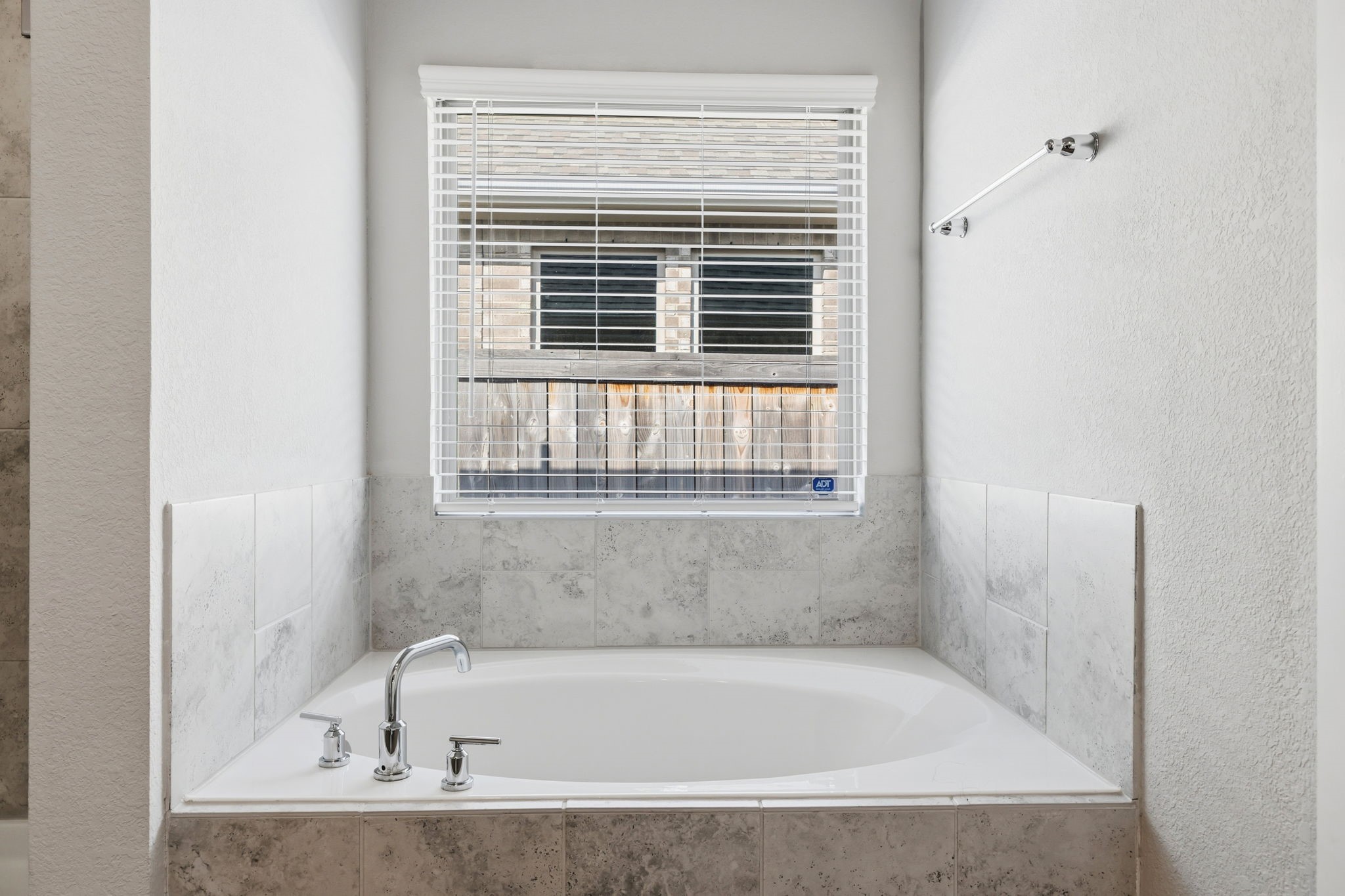14914 Big Bend Ranch Drive Cypress, TX 77433 - Photo 22 of 49 a white bath tub sitting next to a window