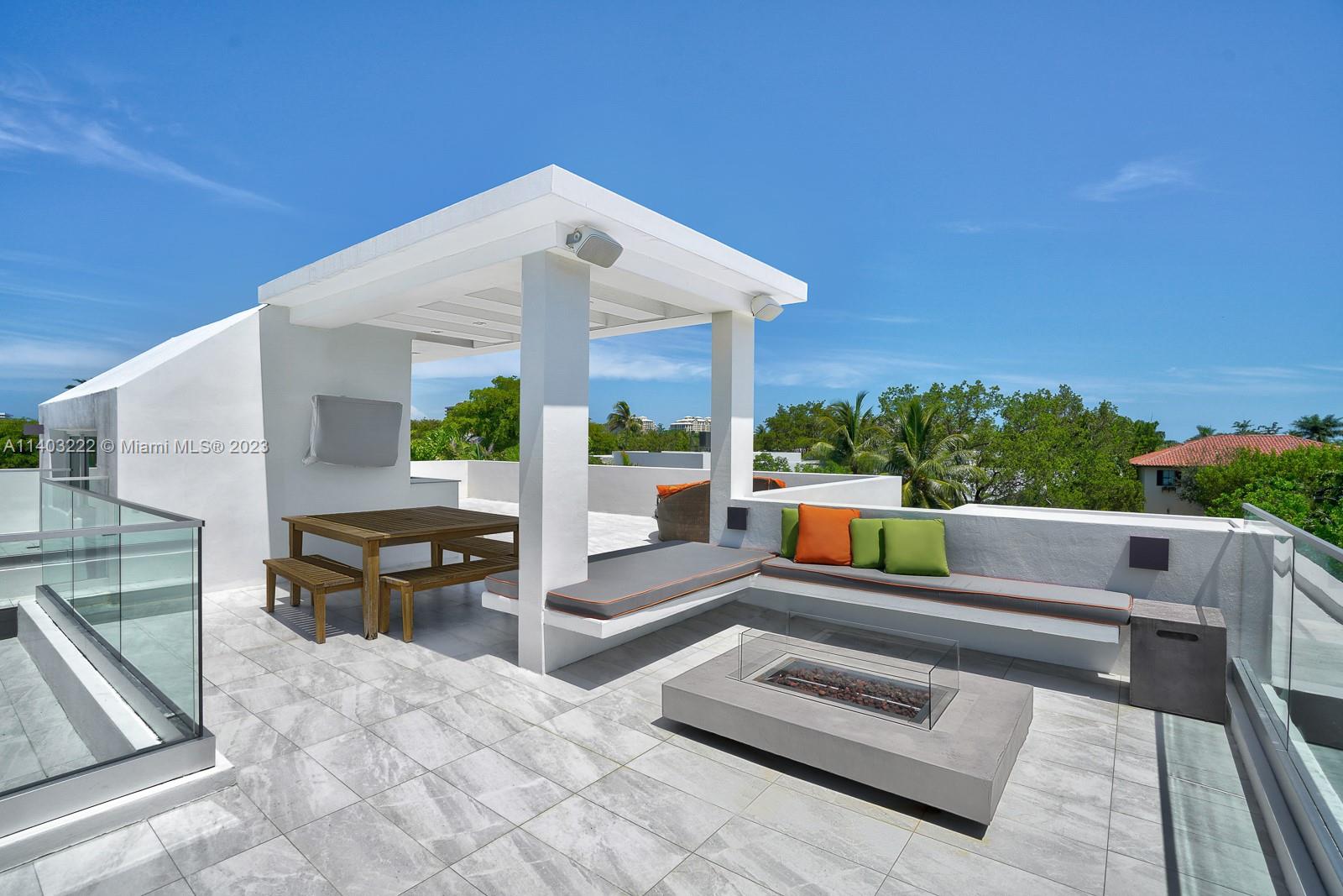 141 Harbor Drive Key Biscayne, FL 33149 - Photo 43 of 56 a outdoor living space with furniture and city view