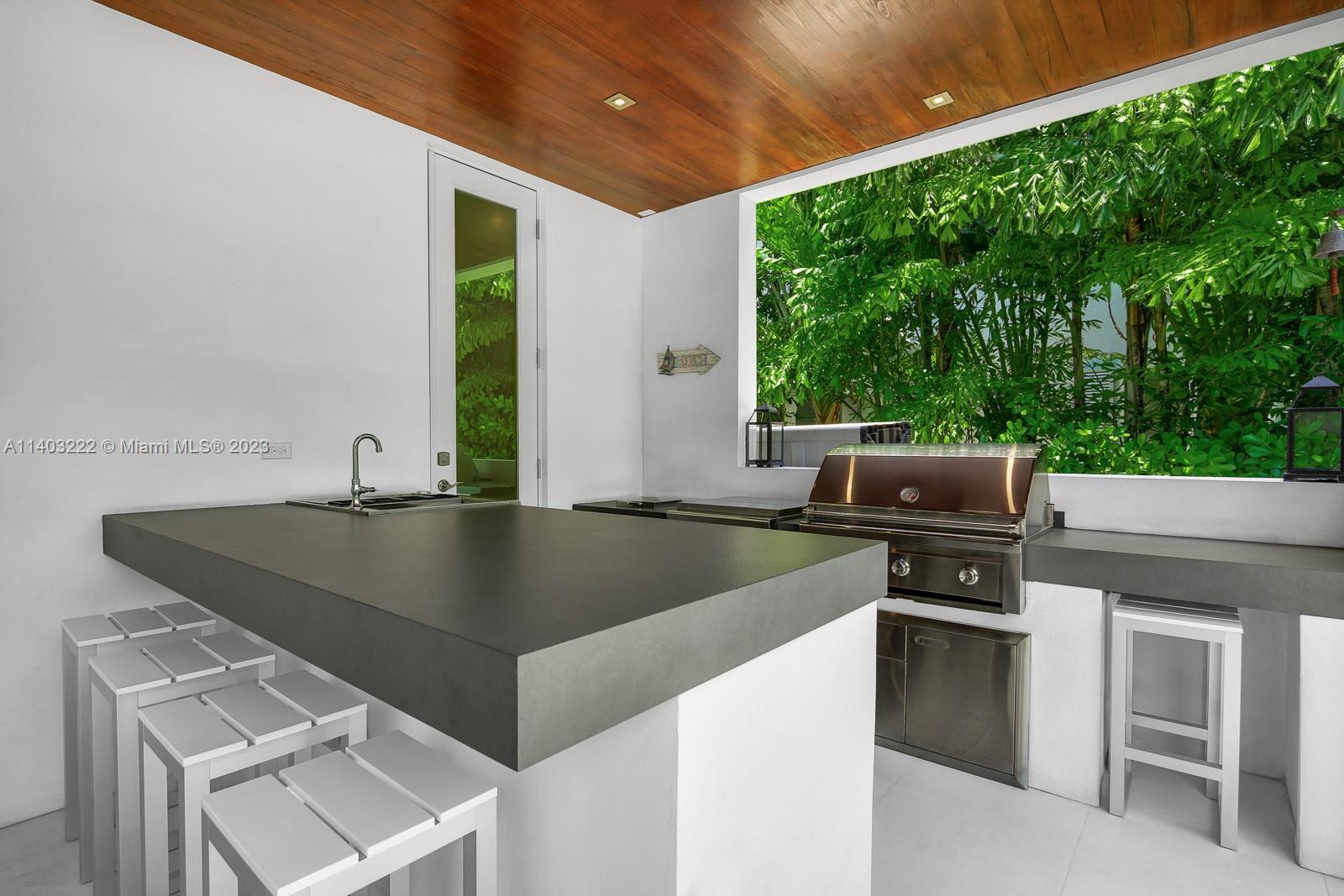 141 Harbor Drive Key Biscayne, FL 33149 - Photo 50 of 56 a view of kitchen with sink and outdoor space