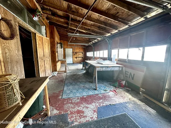 a outdoor space with lots of furniture and shower