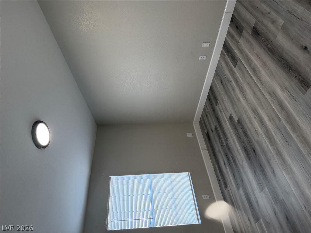6041 Hafen Ranch Road Pahrump, NV 89061 - Photo 7 of 12 Clean lines and durable wood-look flooring enhance this inviting interior space.