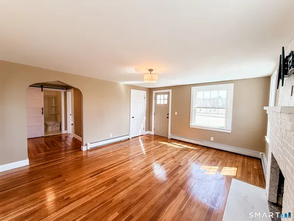 a kitchen with stainless steel appliances granite countertop a sink and stove top oven