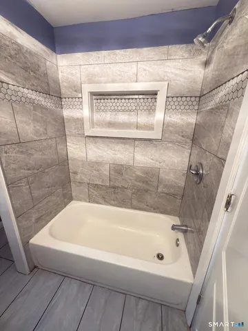 a bathroom with a bathtub