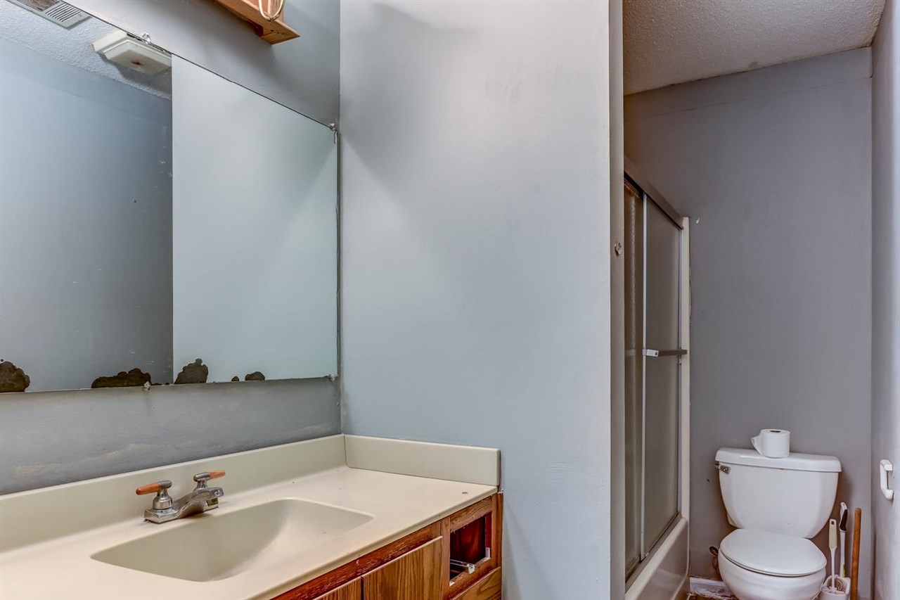 10 Windsor Road Memphis, TN 38109 - Photo 14 of 25 a bathroom with a sink and a toilet