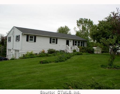 406 Linkfield Road Watertown, CT 06795 - Photo 1 of 1 a view of a house with a backyard