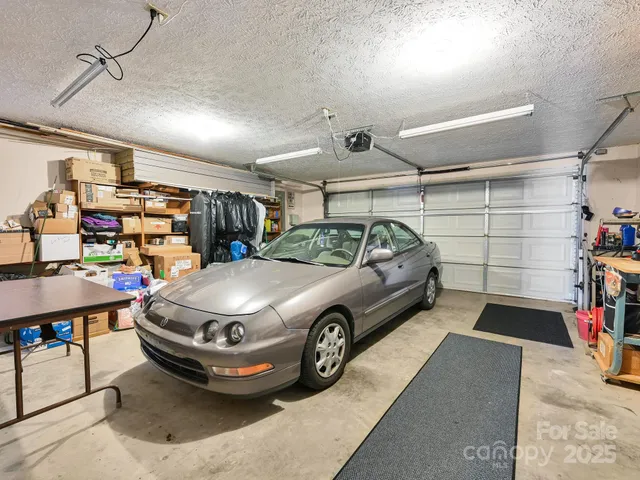 a view of deck with furniture and barbeque oven