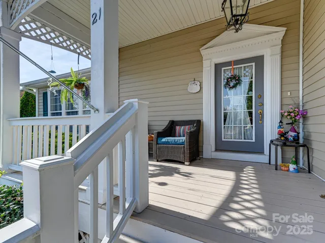 a view of house with wooden floor and a potted plant