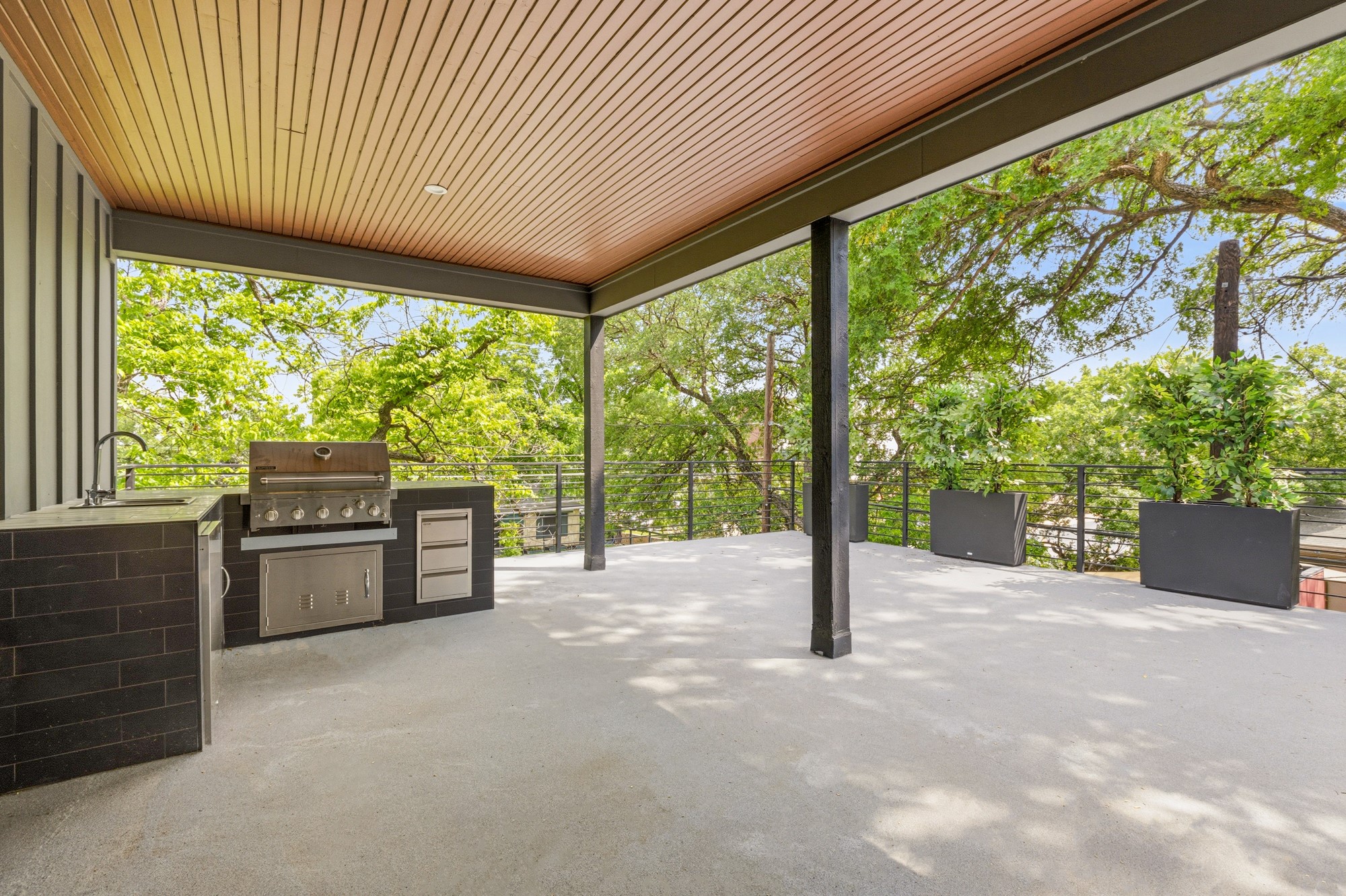 2300 Bluebonnet Lane Austin, TX 78704 - Photo 34 of 40 a view of a garden with an outdoor kitchen