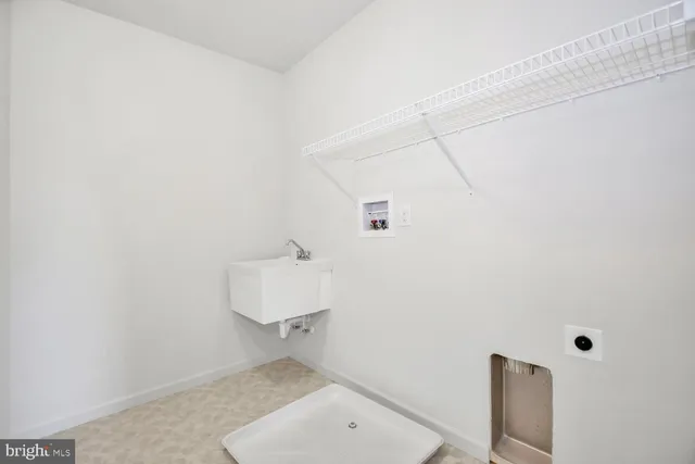 a bathroom with a sink and toilet