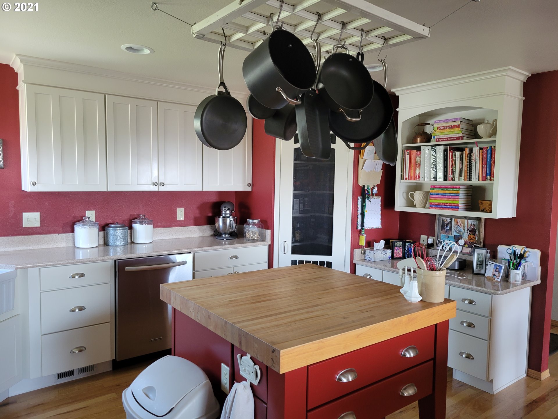 1902 Southwest Perkins Avenue Pendleton, OR 97801 - Photo 11 of 32 a kitchen with stainless steel appliances a sink cabinets and wooden floor