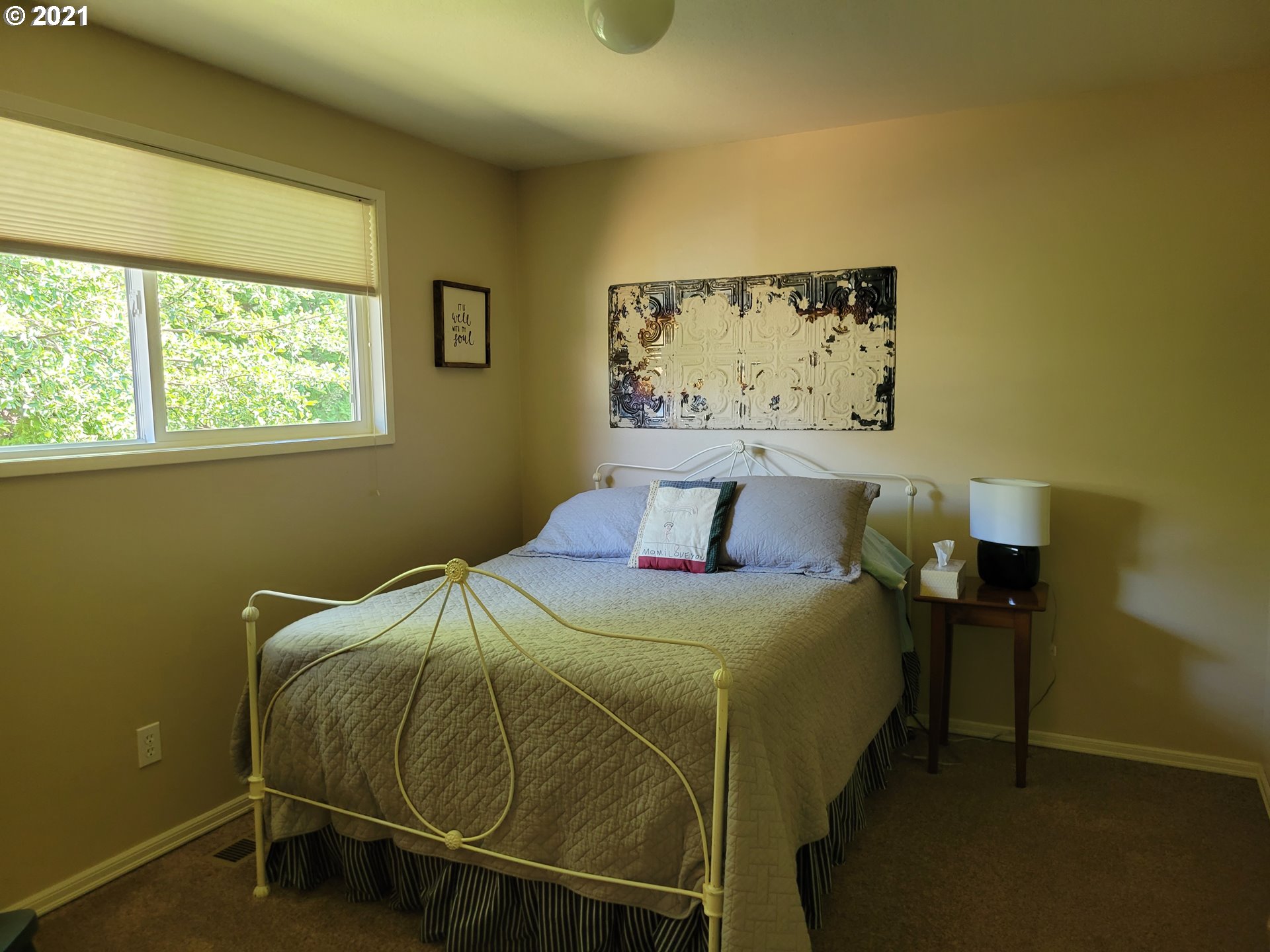 1902 Southwest Perkins Avenue Pendleton, OR 97801 - Photo 20 of 32 a bedroom with a bed and a window
