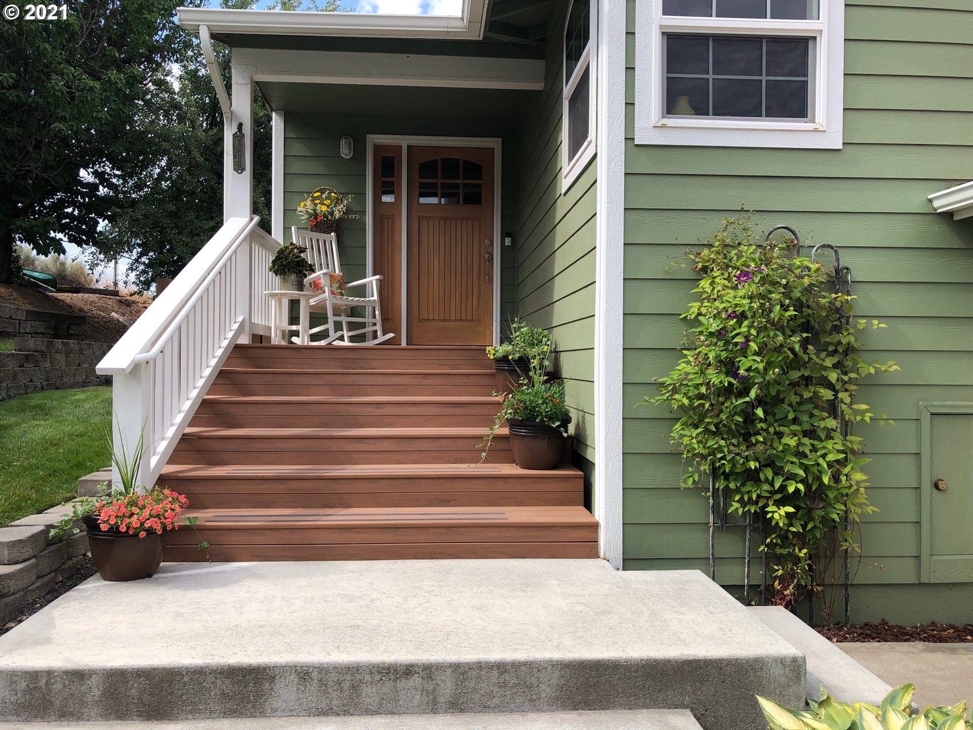 1902 Southwest Perkins Avenue Pendleton, OR 97801 - Photo 4 of 32 a view of a house with entryway and flower plants