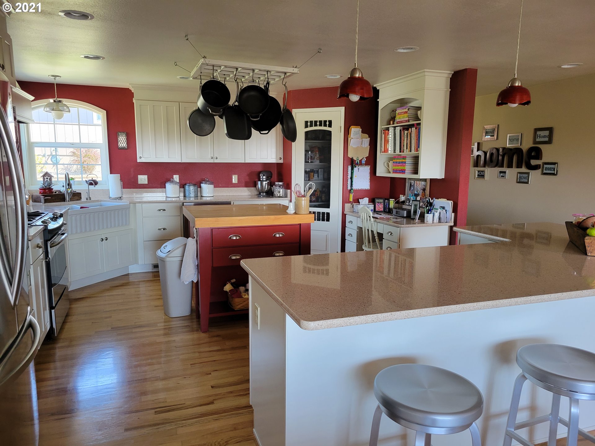 1902 Southwest Perkins Avenue Pendleton, OR 97801 - Photo 5 of 32 a kitchen with a table chairs and a wooden floor