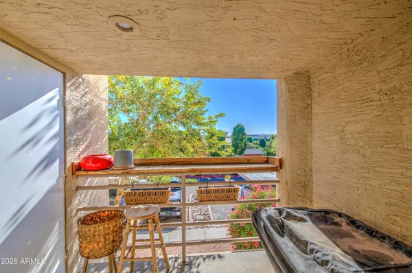 a view of a balcony cabinets and outdoor space