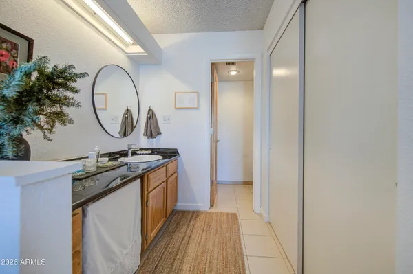 a kitchen with a sink and a stove