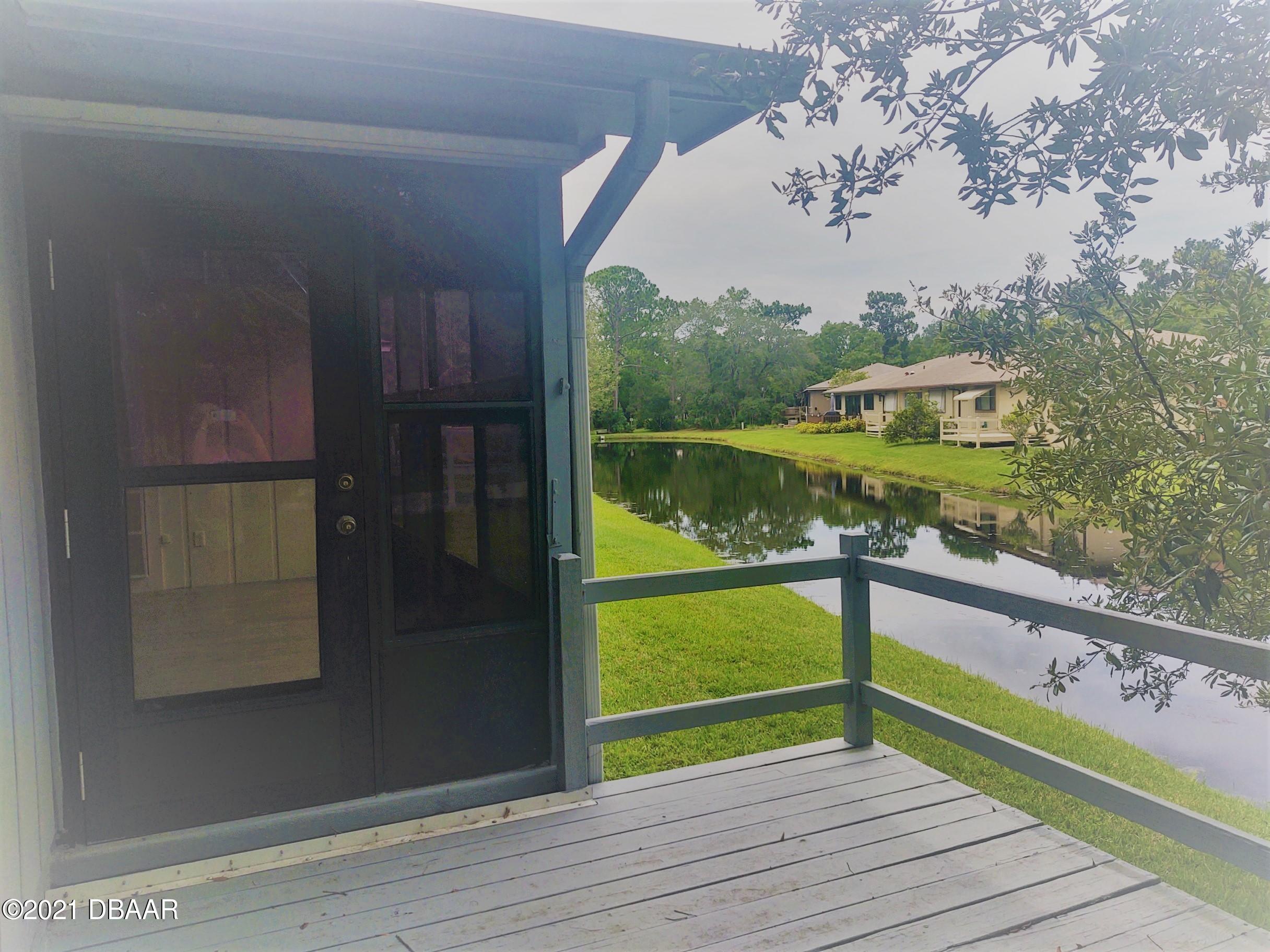 100 Rustic Pond Road Port Orange, FL 32128 - Photo 17 of 28 Rear Deck on Pond