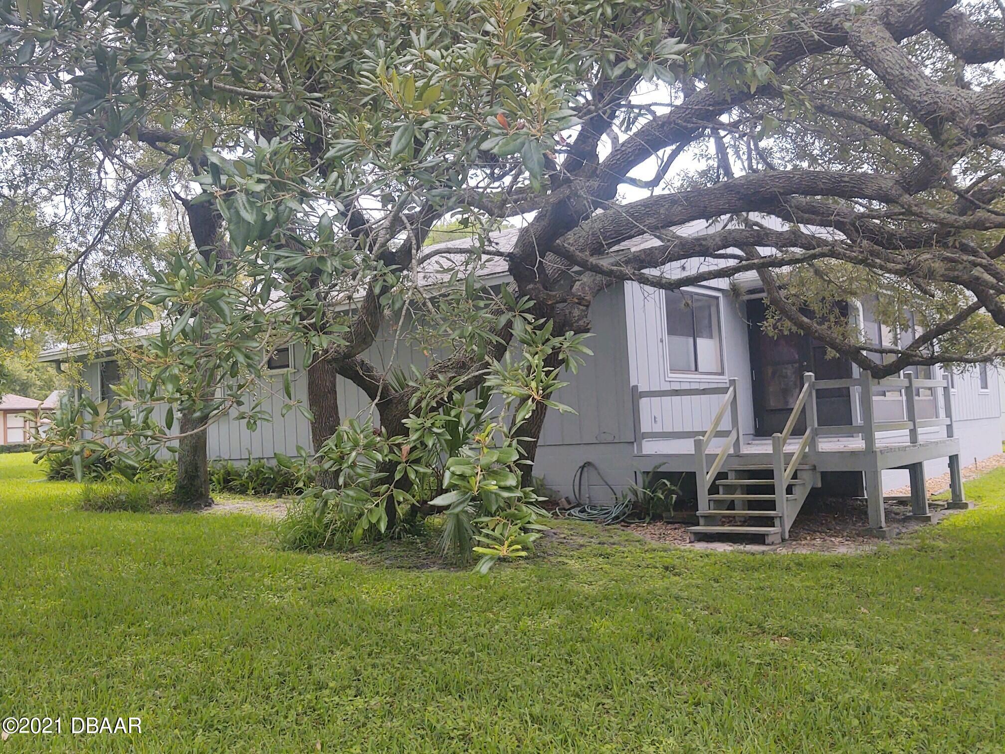 100 Rustic Pond Road Port Orange, FL 32128 - Photo 19 of 28 Rear Side View