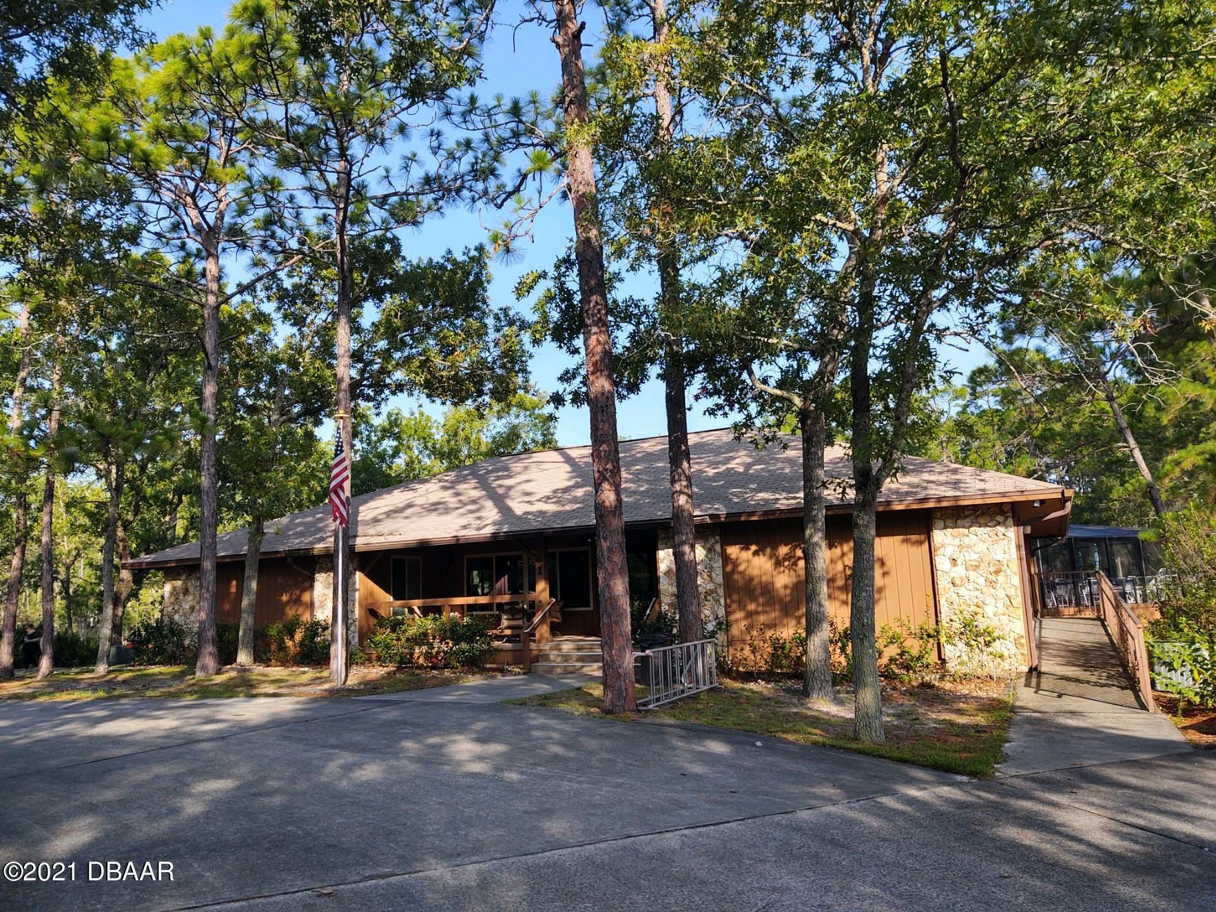 100 Rustic Pond Road Port Orange, FL 32128 - Photo 20 of 28 Clubhouse Entrance