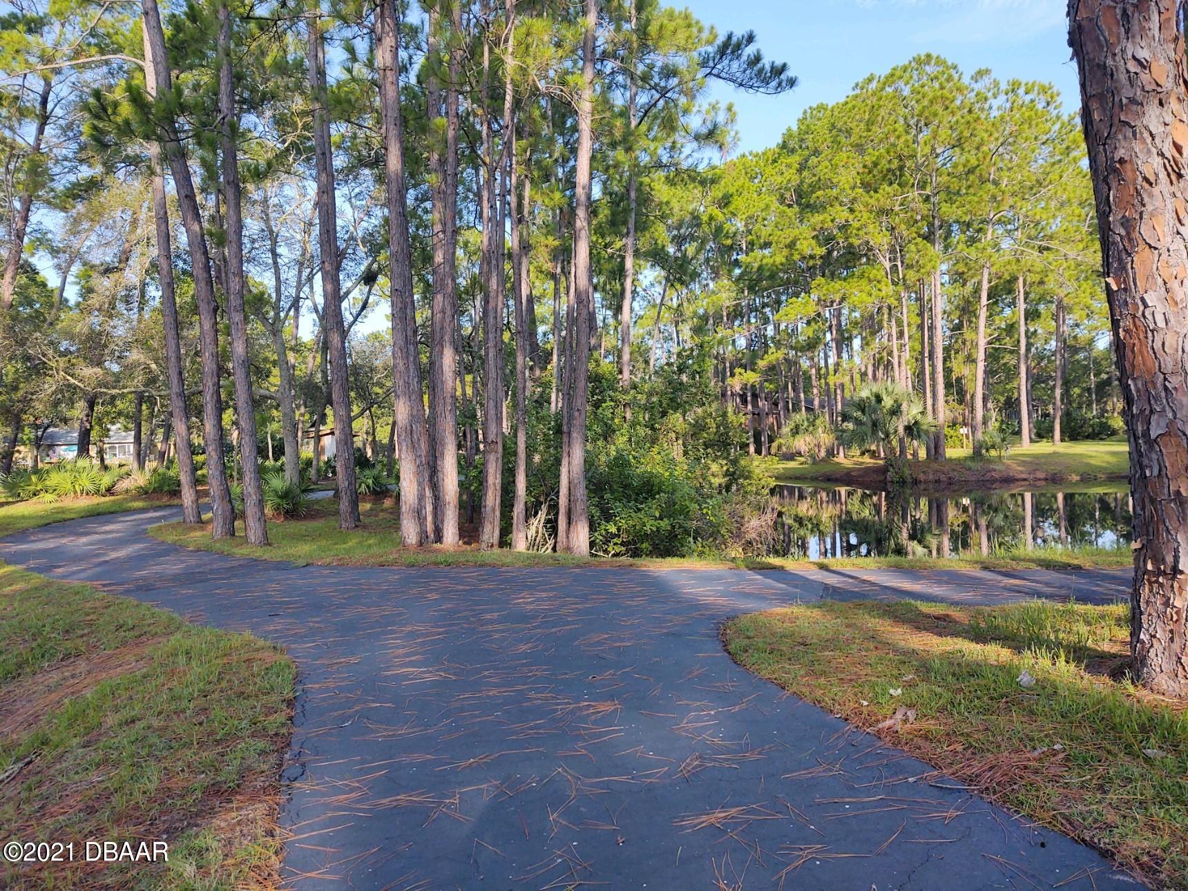 100 Rustic Pond Road Port Orange, FL 32128 - Photo 23 of 28 4 miles of trail