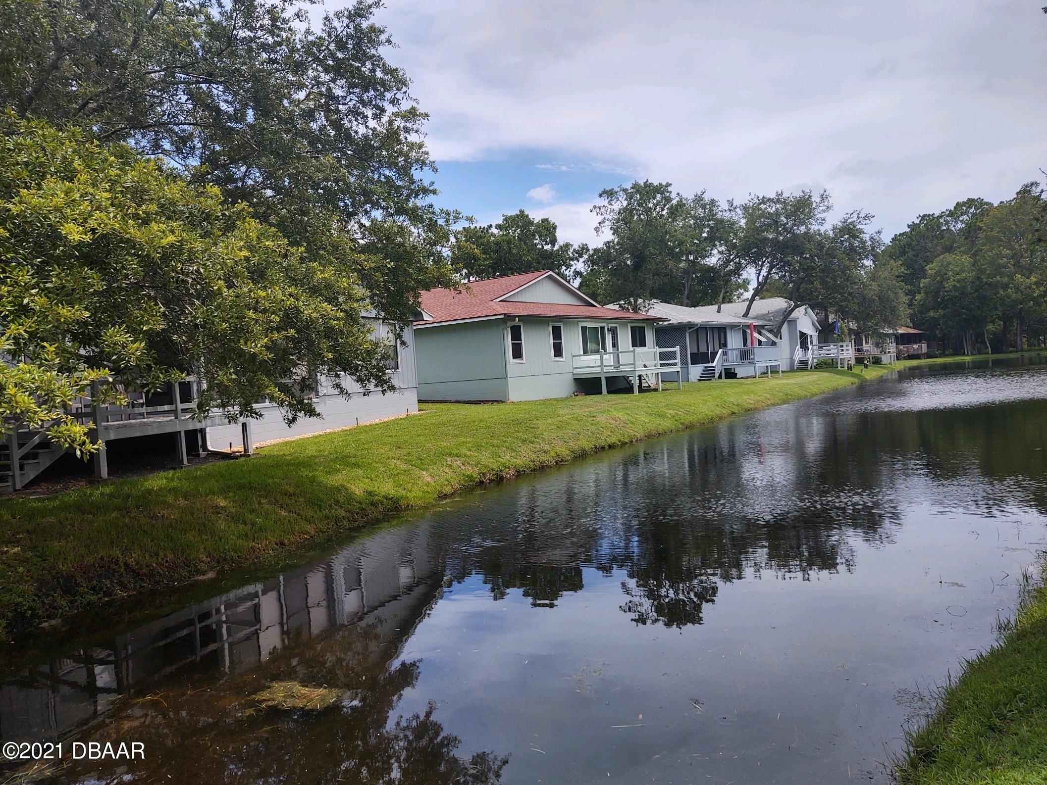 100 Rustic Pond Road Port Orange, FL 32128 - Photo 26 of 28 Pond Behind House
