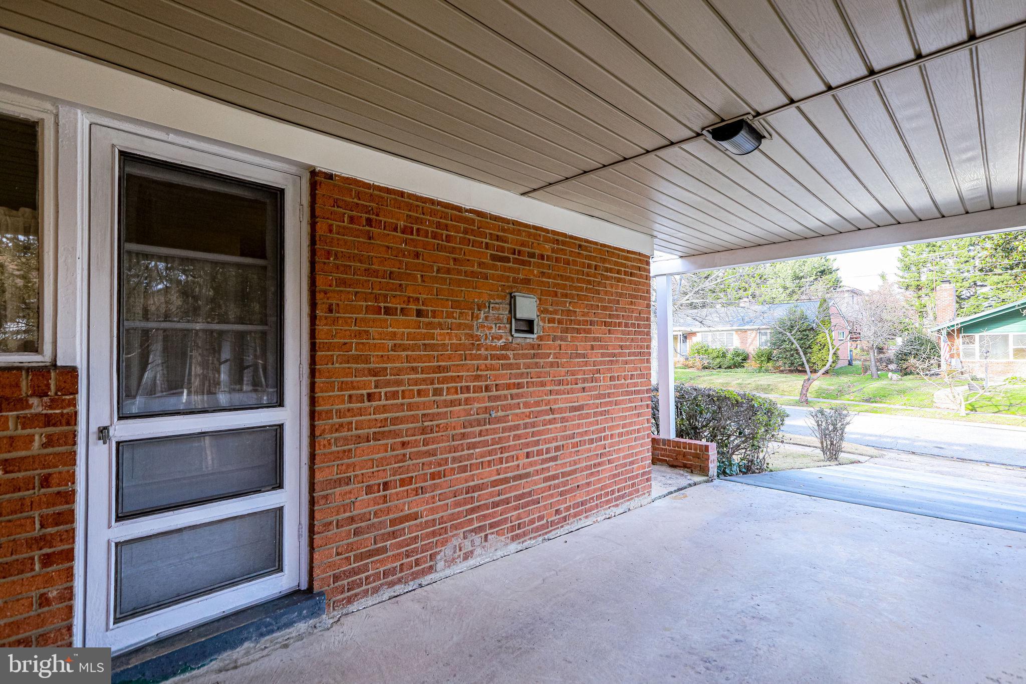 1212 Ballard Street Silver Spring, MD 20910 - Photo 3 of 41 Kitchen entrance from carport.