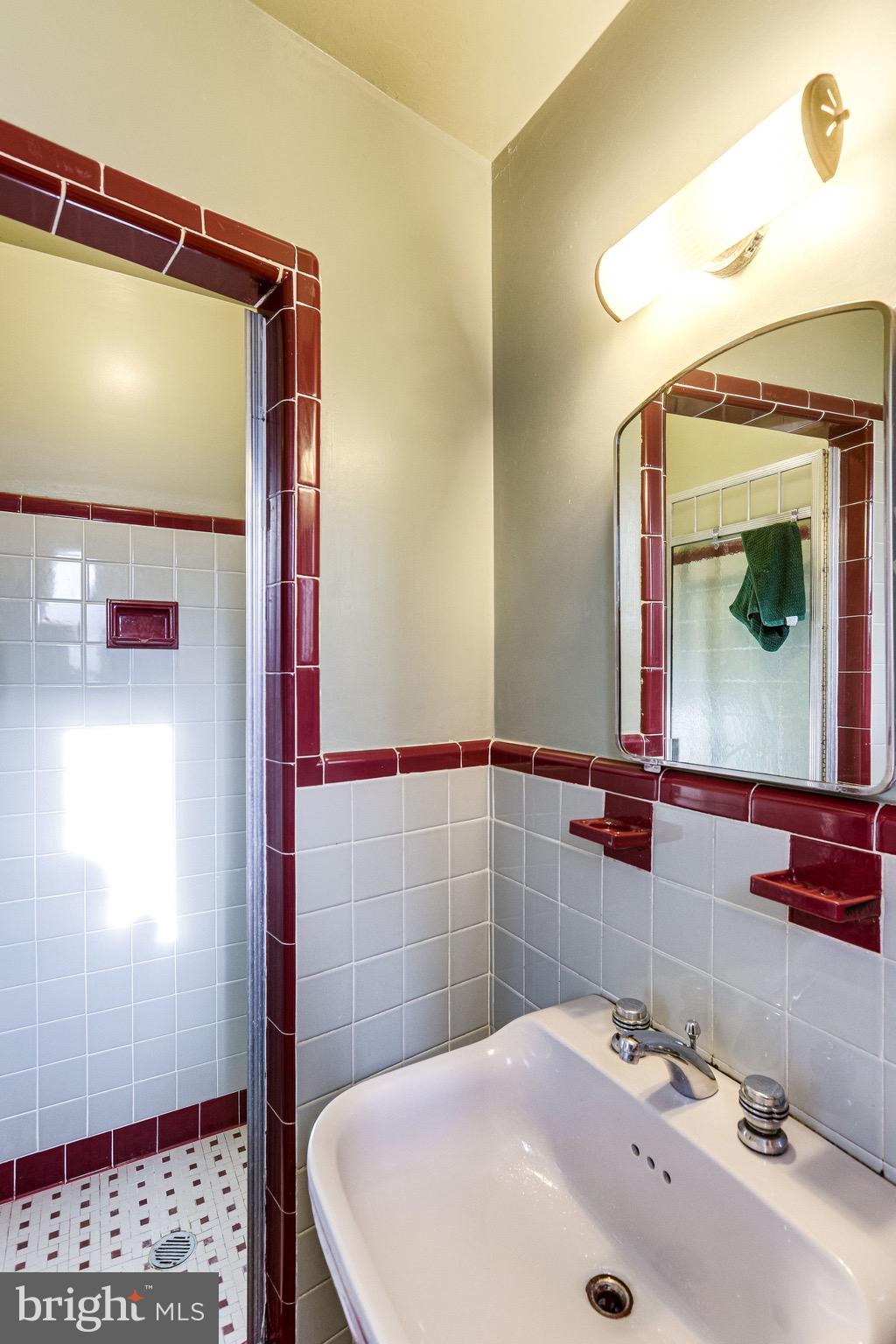 1212 Ballard Street Silver Spring, MD 20910 - Photo 21 of 41 Primary bathroom with ceramic tile.