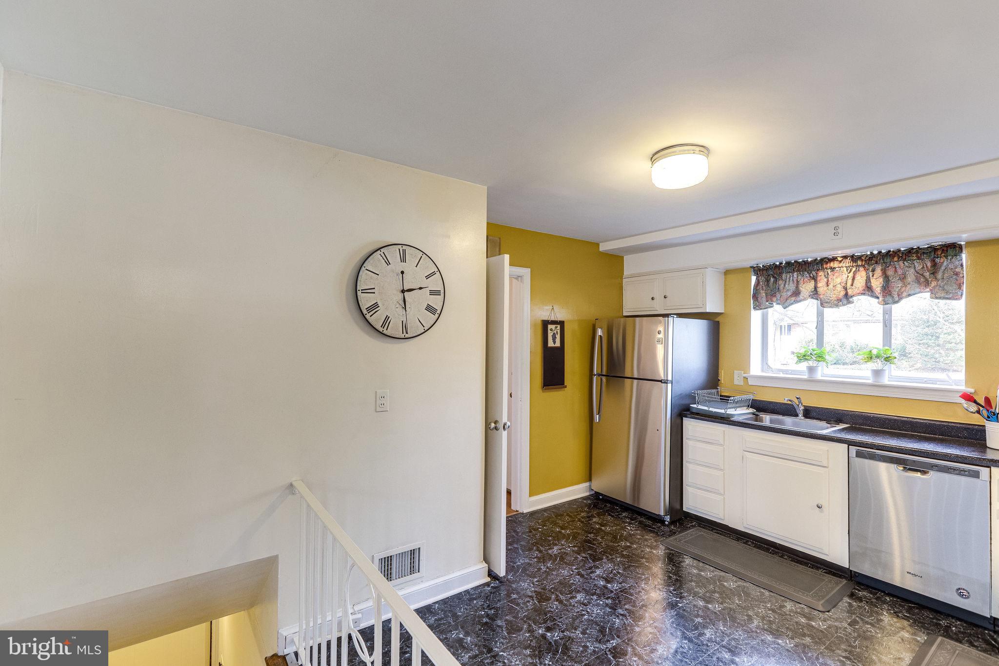1212 Ballard Street Silver Spring, MD 20910 - Photo 24 of 41 Kitchen has vinyl flooring.