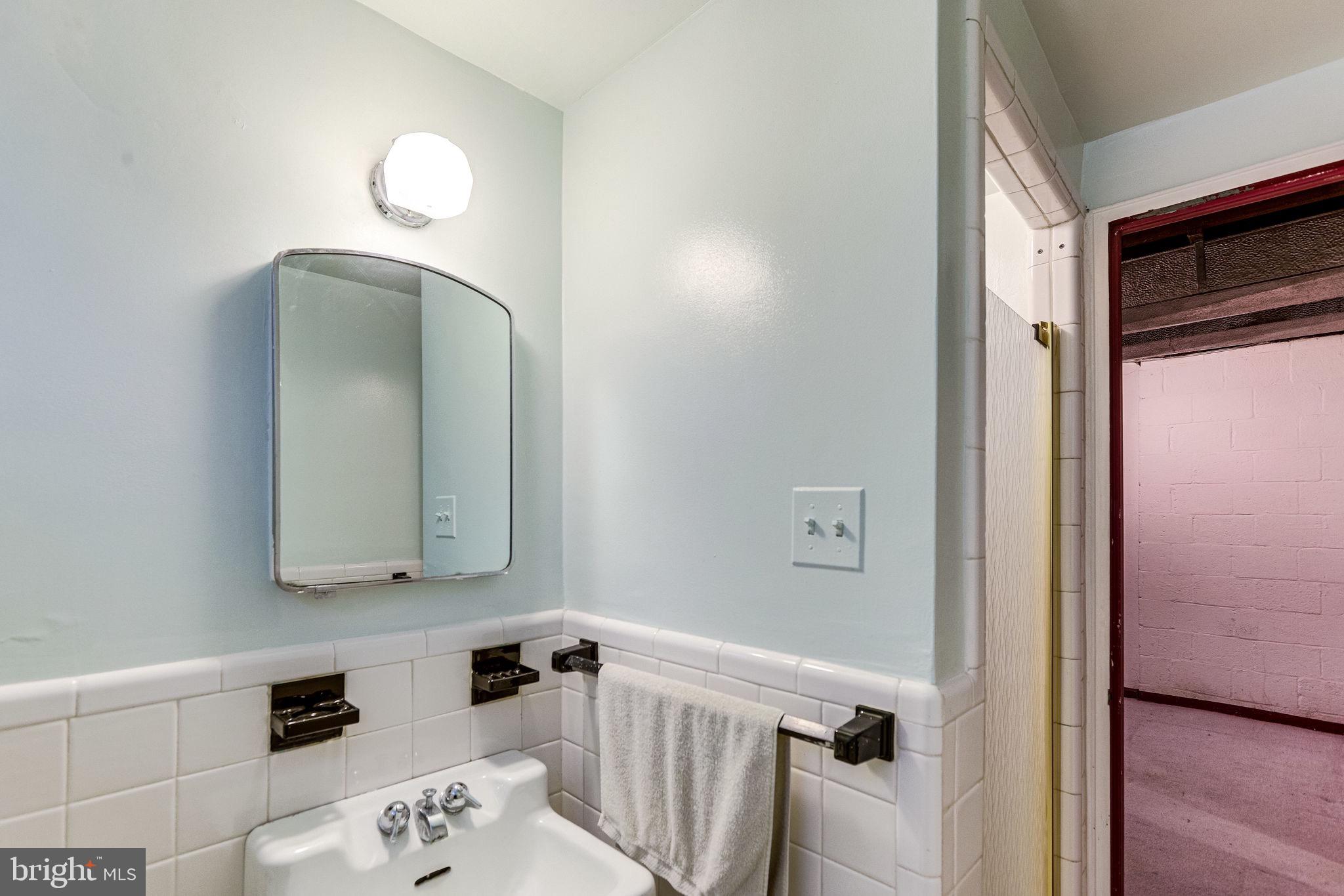 1212 Ballard Street Silver Spring, MD 20910 - Photo 35 of 41 Full bath in basement has tile and shower.